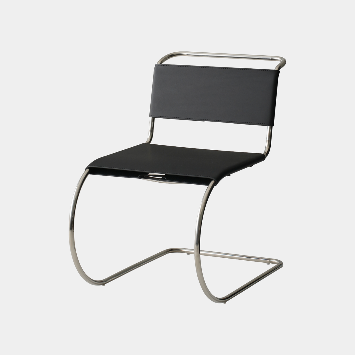 A modern cantilever chair with a black upholstered seat and backrest, supported by a curved polished metal frame, shown against a plain light gray background.