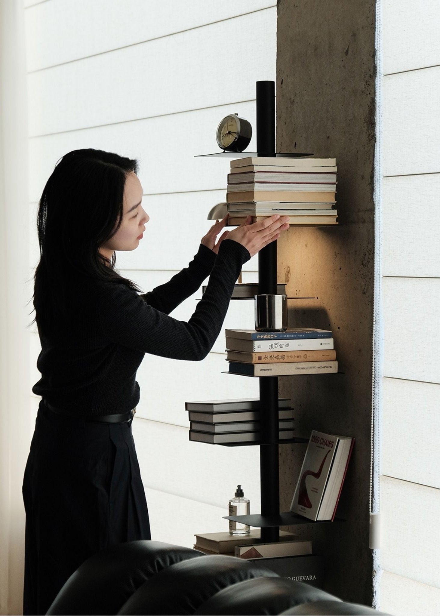 Rotating Metal Book Tower