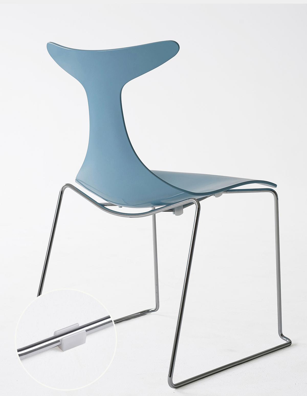 A modern light blue molded plastic chair with a chrome metal frame, shown against a plain white background with a circular detail inset of the leg mechanism.