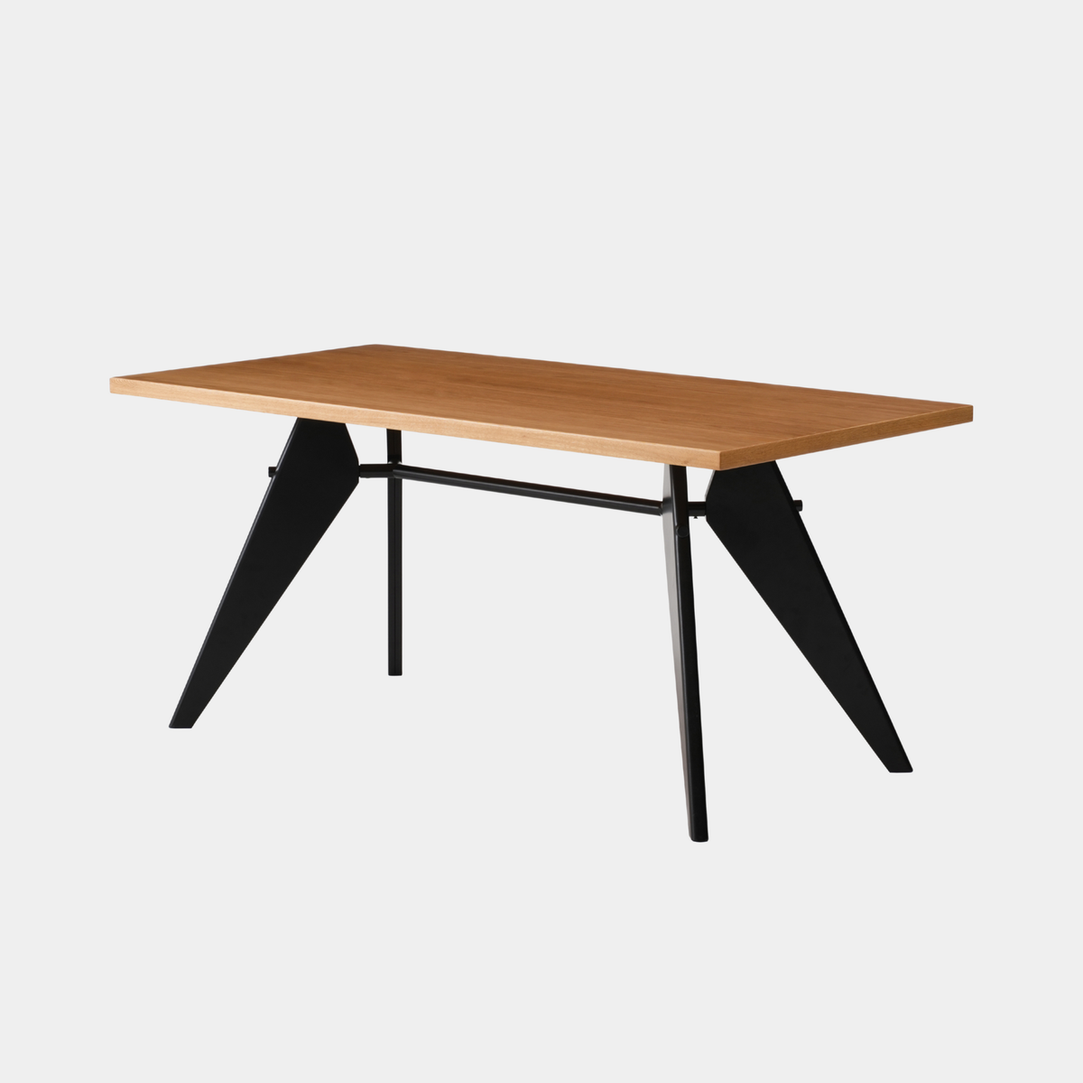 A modern rectangular desk with a light brown wood grain tabletop and a black metal frame with angled legs, shown on a light gray background.