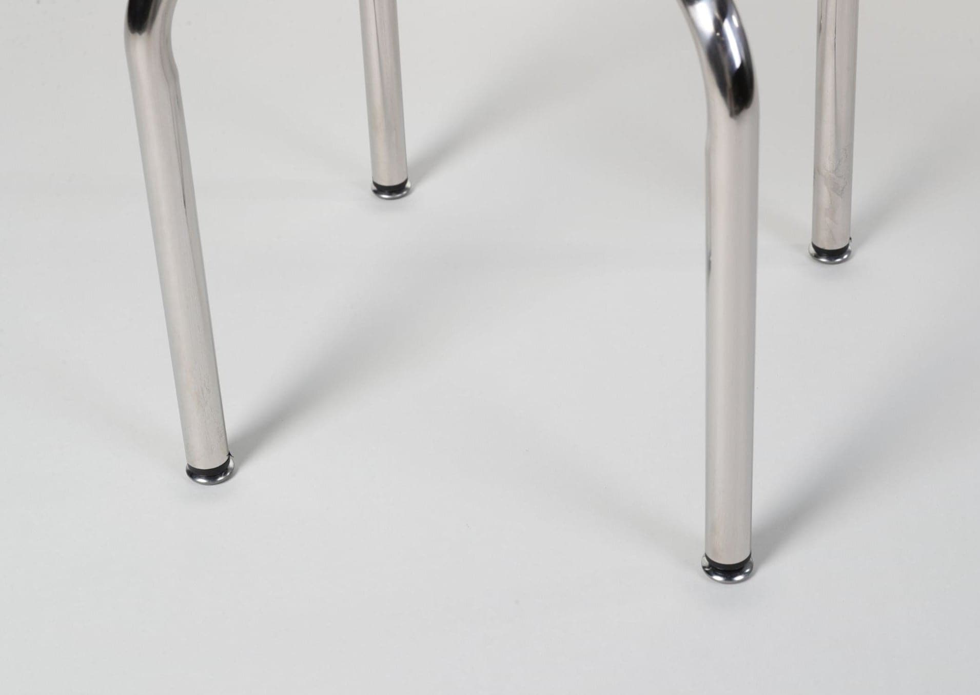 LC7 Swivel Chair | Charlotte Perriand Replica - The Feelter
