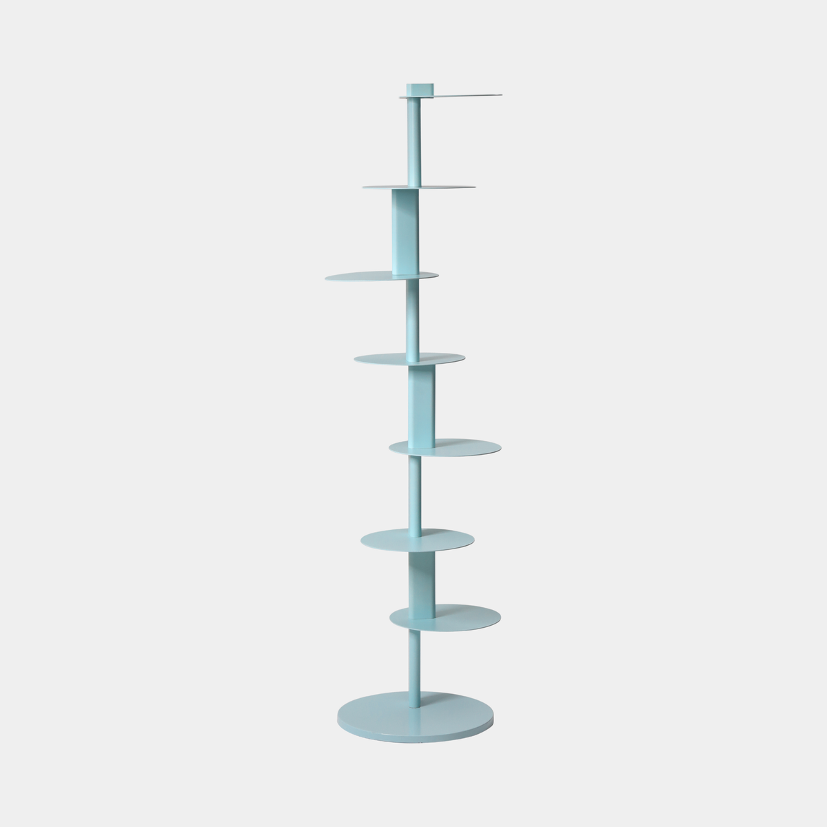 A tall, slender light blue shelving unit with multiple circular tiers and a round base, shown on a plain light gray background.