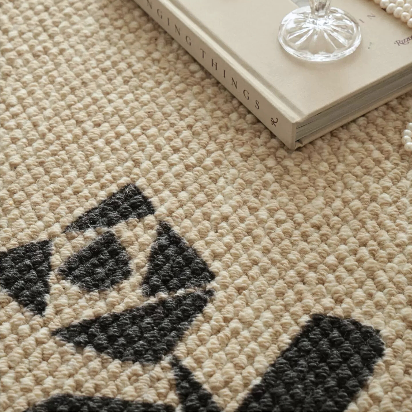 The Feelter Rose Border Wool Rug