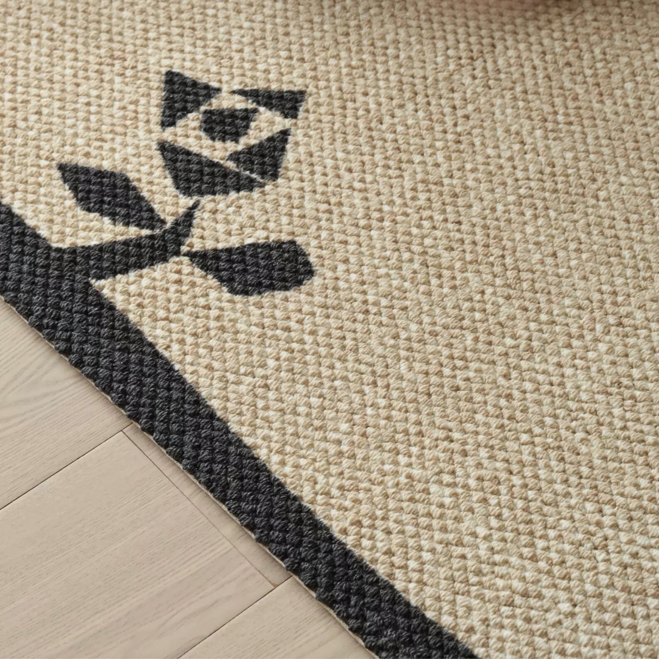 The Feelter Rose Border Wool Rug