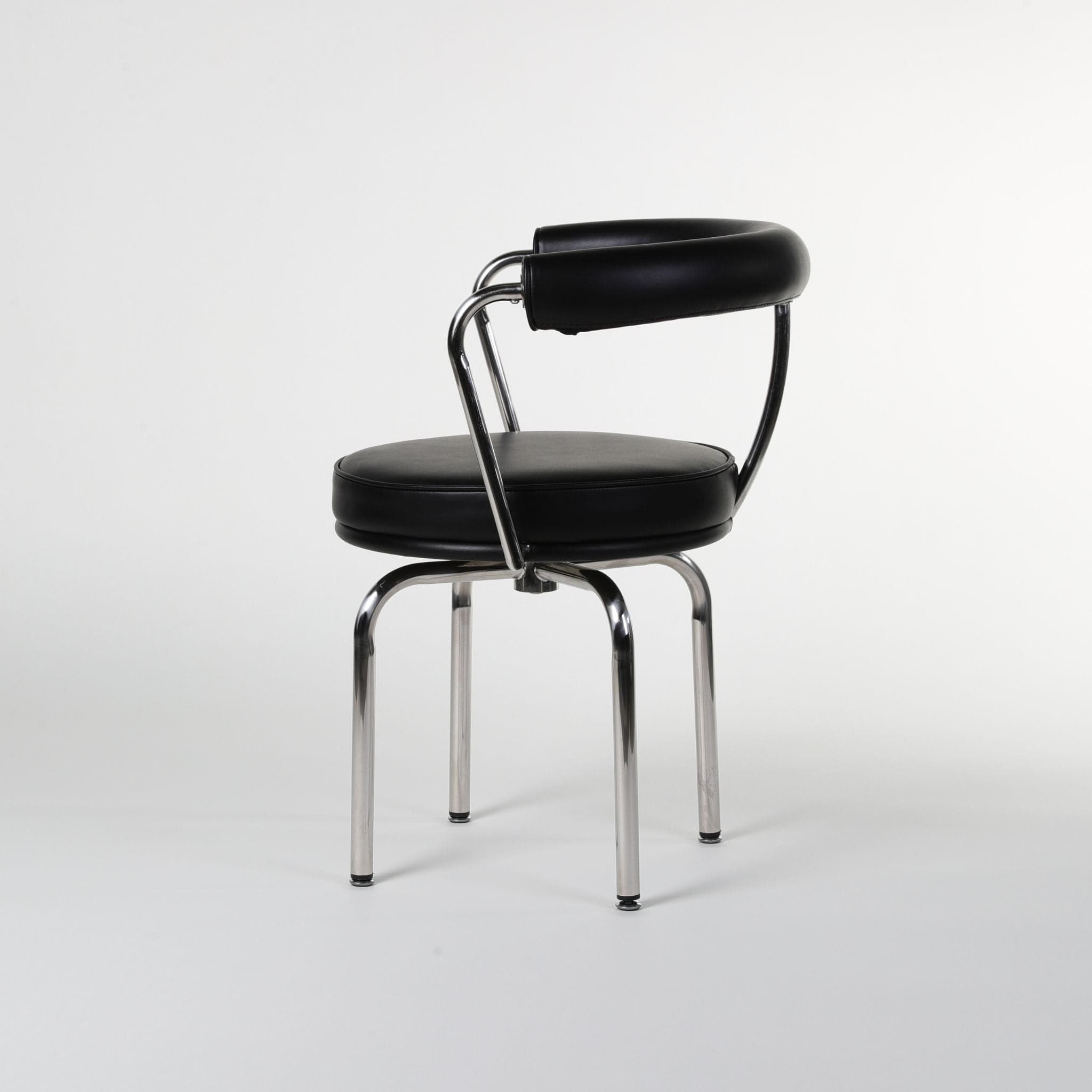 LC7 Swivel Chair | Charlotte Perriand Replica - The Feelter