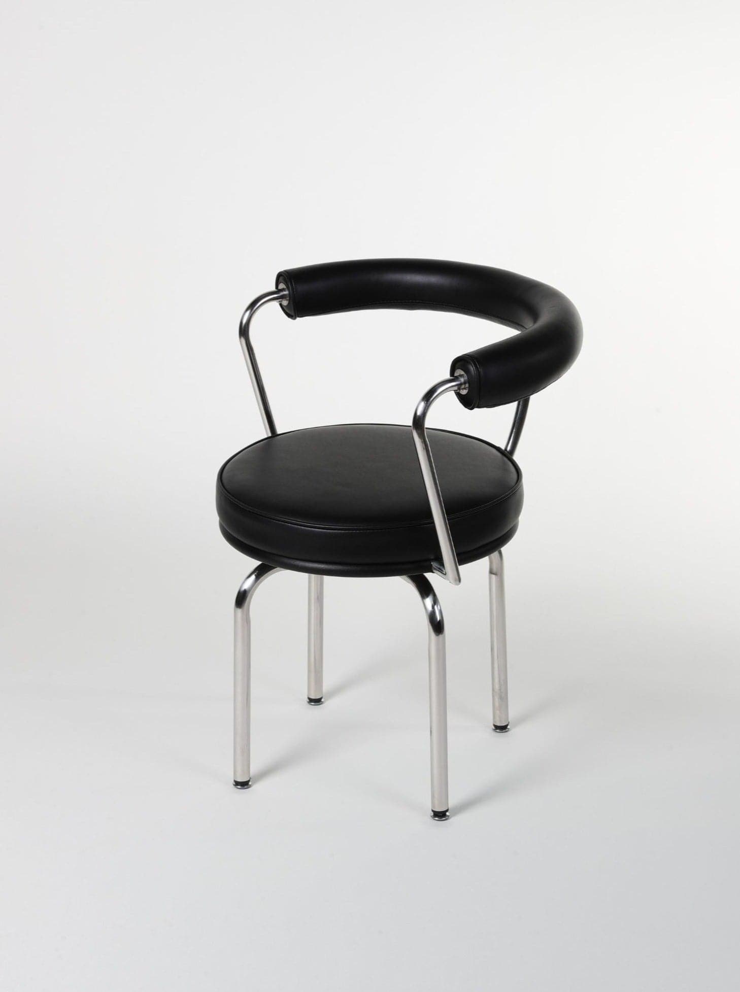 LC7 Swivel Chair | Charlotte Perriand Replica - The Feelter