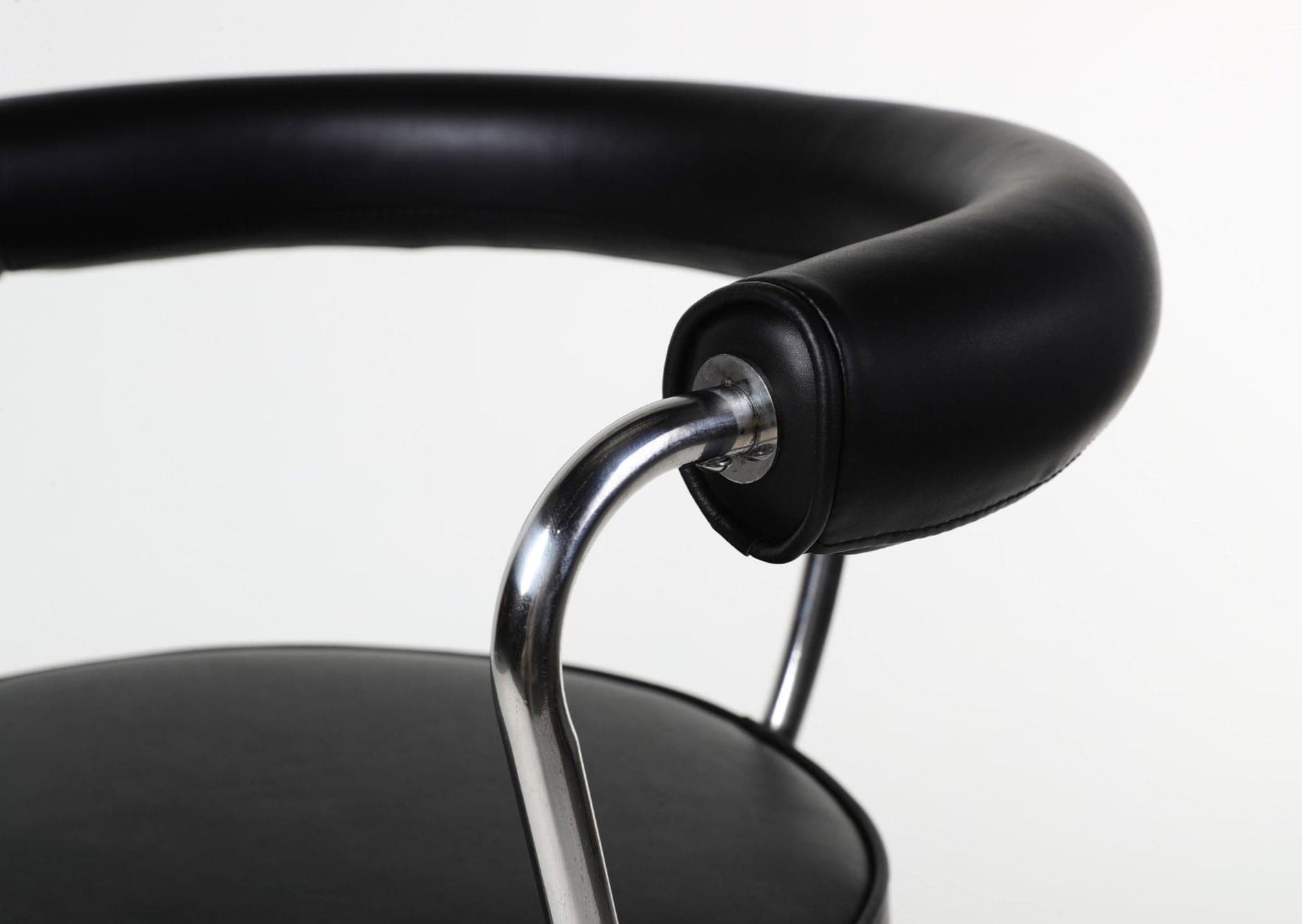 LC7 Swivel Chair | Charlotte Perriand Replica - The Feelter