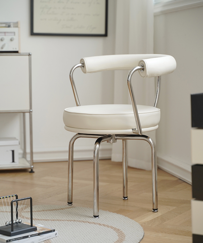 LC7 Swivel Chair | Charlotte Perriand Replica - The Feelter