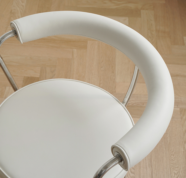 LC7 Swivel Chair | Charlotte Perriand Replica - The Feelter