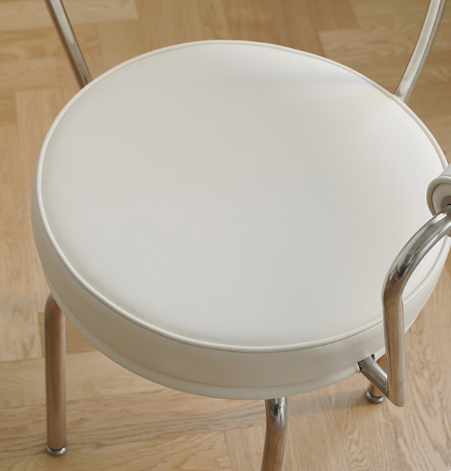 LC7 Swivel Chair | Charlotte Perriand Replica - The Feelter