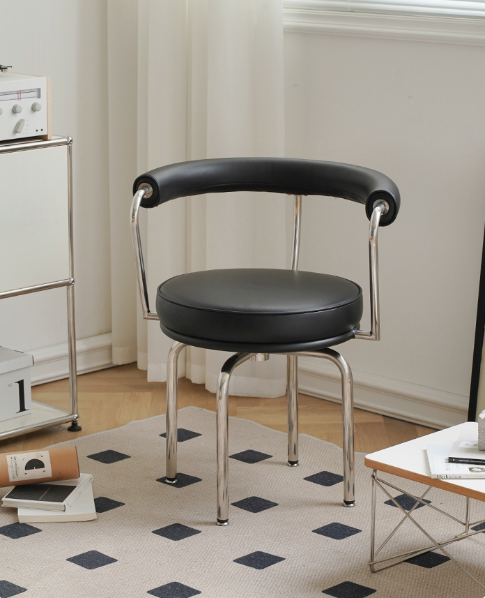 LC7 Swivel Chair | Charlotte Perriand Replica - The Feelter